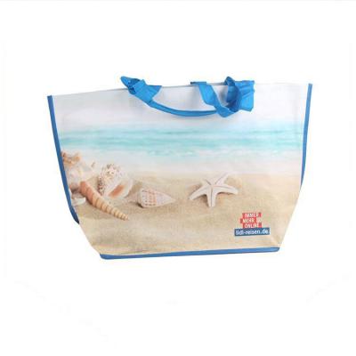 China New Eco-friendly Recyclable Recyclable Sand Beach Shell Pattern Blue Handle Woven Shopping Bag for sale