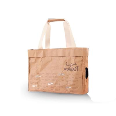 China Recyclable Personalized Custom Printing Fashion Easy Carry Large Capacity Washable Kraft Paper Bag for sale