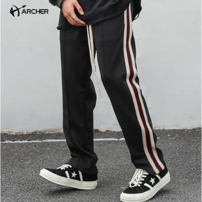 China Custom Breathable Mens Rocket Casual Sport Tracksuit Sports Wear Wide Leg Split Straight Pants Mens Unisex Sweatpants for sale