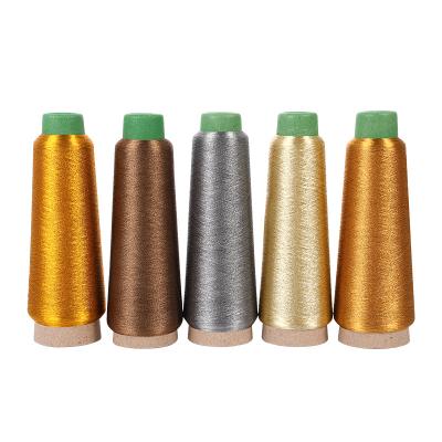 China Polyester / Metallic Colored Soft Reflect MX Type Shiny Light Gold Nylon Blend Metallic Yarn For Knitting for sale