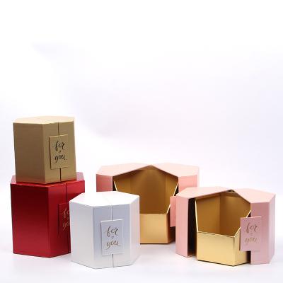 China Exquisite Creative Stain Hexagons High Quality Disposable Double Door Mounted Flower Package Boxes Small Size for sale