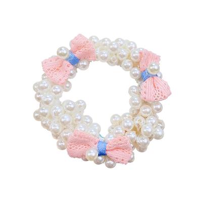 China 2022 Fashion Sweet Design Bow Hair Decoration Rubber Pearl Hair Ties For Girls for sale