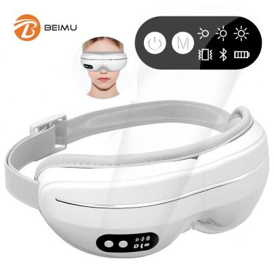 China Smart Foldable Head Massager Machine Facial Wrinkle Remover Hot Vibration Heat Eye Massager for sale