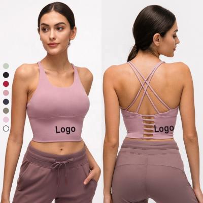 China Solid Color Fitness Women Workout Yoga Bra Female Yoga Bra Top Back Breathable Cross Shockproof Sexy Sports Bra for sale