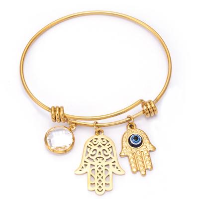 China New Hyperbole Stainless Steel Design Crystal Charms Pendant Gold Plated Hamsa Hand Bracelet from Fatima Bangle Jewelry Wholesale for sale