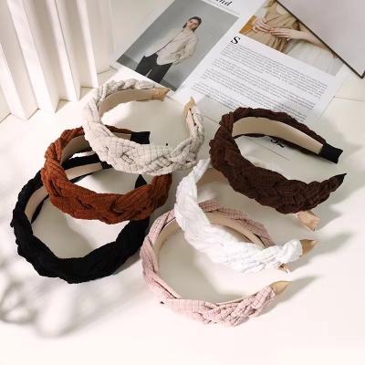 China JIANYI style autumn and winter solid color European and American women go out to squeeze braids hair simple and soft headband for sale