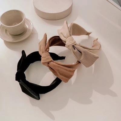 China JIANYI style new and beautiful European and American girl feeling solid color cloth wash face soft headband for sale