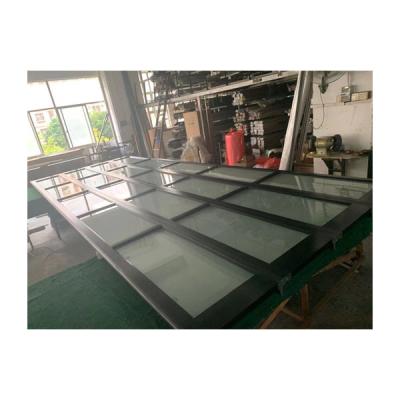 China Modern High Quality Customized Black Aluminum Frame Insulated Frosted Glass Double Panel Garage Door for sale