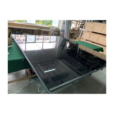 China Modern high quality frameless glass panel sectional garage door for sale