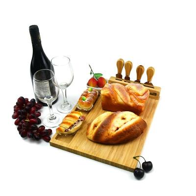 China Sustainable Charcuterie Platter, Bamboo Cheese Board Set With 4 Stainless Steel Knife Serving Utensils for sale