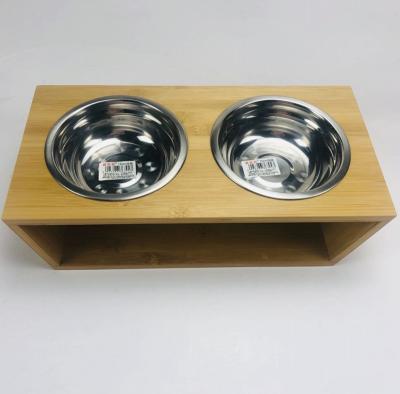 China Sustainable Dog Food Adjustable Bamboo Rack Raised Dog Bowl Pet Feeding Station for sale