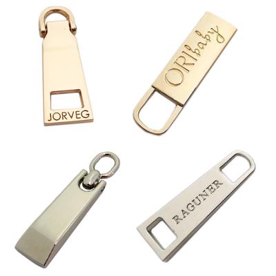 China Custom Engraved Design Nickel Free Zinc Alloy Silver Gold Brand Logo Metal Zipper Puller For Handbags for sale