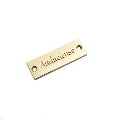 China China Zinc Alloy Custom Sew Metal Logo Label Tag Plate For Swimwear for sale