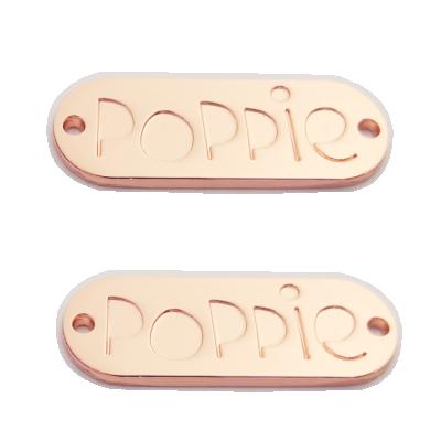 China Viable Design Oval Engraved Custom Brand Logo Metal Tag Label Plate For Apparel for sale