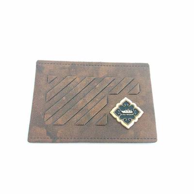 China custom 3D fashion china pu brand logo leather label patch with metal for jeans for sale