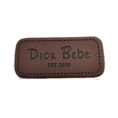 China Sustainable Cheap Fake Embossed Branded Logo Custom Leather Patch Label For Denim for sale