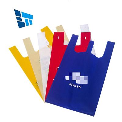 China Cheap Walmart T-shirt Plastic T-shirt Plastic Bag T-shirt Plastic T-shirt Handled Nonwoven Reusable Packaging Shopping T-shirt Packaging Plastic Bag for sale