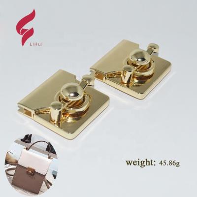 China Eco-friendly Custom Square Metal Bag Turn Lock Hardware Gold Handbag Hardware Metal Turn Lock for sale