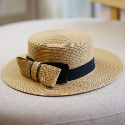 China Straw Summer Fashion Lady Flat Top Bow Beach Street Shoot Straw Hat Large for sale