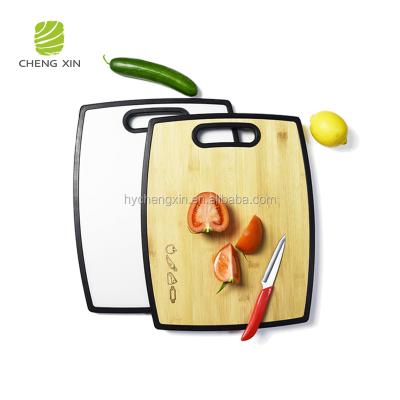 China New Design High Quality Double Side Sustainable Use Kitchen Bamboo Cutting Board for sale