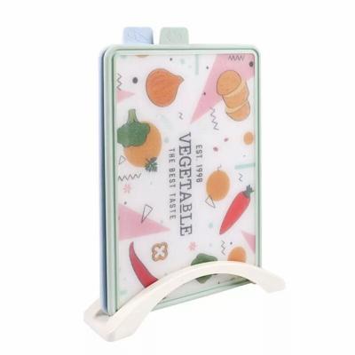 China Durable Eco-friendly Durable Abrasion Resistance PP Multifunctional Plastic Cutting Board Set With Stand for sale