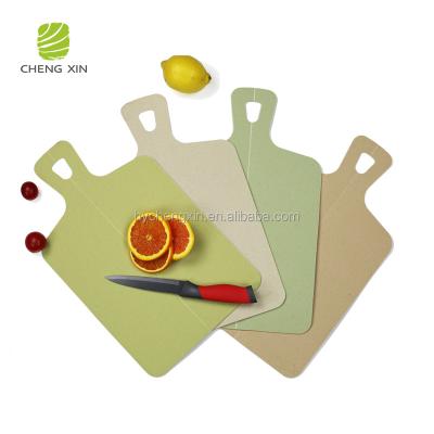 China Eco-Friendly Sustainable Hot Sale Wheat Straw Plastic Cutting Board With Handle for sale