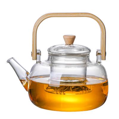 China 900ml Sustainable Glass Teapot with Removable Infuser, Safe Stovetop Tea Kettle with Candle Holder Protect Tea for sale