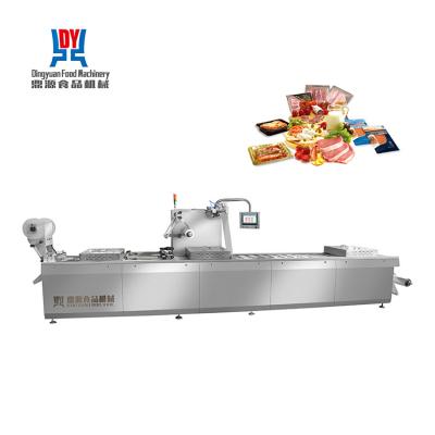 China Automatic Thermoforming Continuous Stretch Film Vacuum Packaging Machine for sale