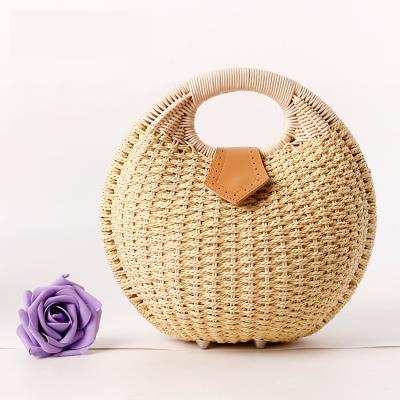 China Handmade Fashion Wholesale Bali Beach Hollow Out Rattan Bags For Woman for sale