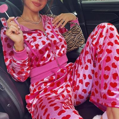 China Love Anti-Static Loose Top Velvet Print Hooded Neon Zipper Sweater Set Loose Sets 2 Piece Sweat Suit For Women for sale