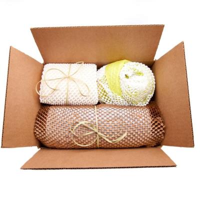 China Recyclable Degradable Brown Honeycomb Low Price Kraft Cushion Packing Paper Cushioning Paper for sale