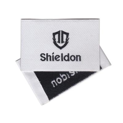 China Eco-friendly high quality ivory silk smooth garment woven brand logo color custom satin label for sale