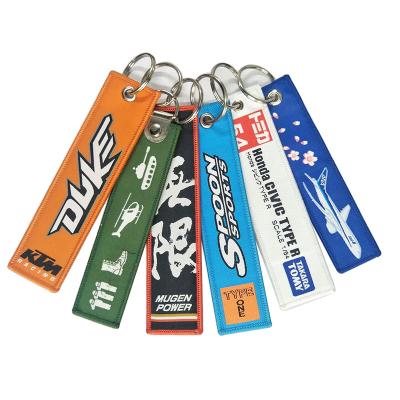 China Eco - Friendly Brand Logo Custom Embroidered Key Chain for sale