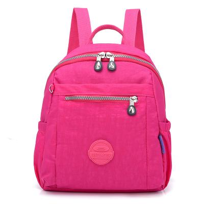 China Water Resistant New arrive wholesale fashion leisure colorful pink casual waterproof nylon backpack for female for sale