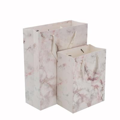 China Recyclable Paper Bag Tote Bag Clothing Shopping Gift Card Bag Pink Marbling White Customization for sale