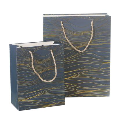 China Recyclable Valentine Gift Shopping Bag Gold Paper Bag Tote Bag Foil Wave Pattern Card Factory In Stock White Package for sale