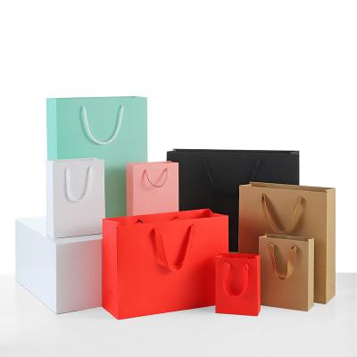 China Recyclable Printing CMYK Paper Recyclable Printing Paper Tote Bag Custom Clothing Store Gift Bag Package Xs Custom Shopping Engraving for sale