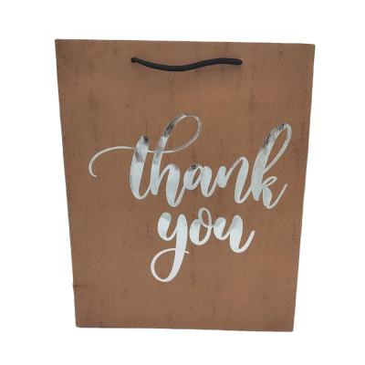 China Recyclable Wholesale Custom Printed Your Own Logo Brown Kraft Gift Craft Shopping Paper Bag With Handles for sale