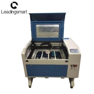 China Laser Engraving Ruida CNC System 60*90 Laser Cutting Machine 6090 For Fabric Leather And Paper for sale