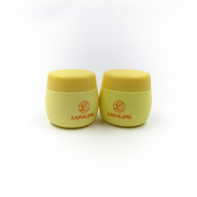 China Cosmetic Free sample kids empty 30ml plastic cream jar bottle round skin care shape jar for sale