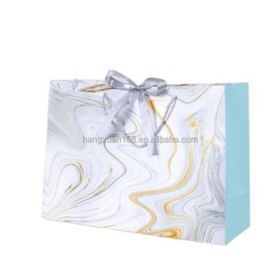 China Recycled Materials Hot Sale Wholesale Paper Material Folding Wedding Door Souvenirs Empty Fancy Gray Marble Paper Luxury Gift Bags for sale