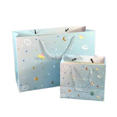 China Recycled Materials Manufacturers direct sales of low-cost large blue space cartoon gifts for children with style packaging gift bags for sale