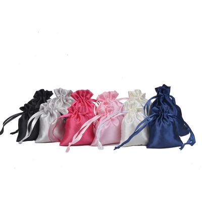 China Customized Logo Design Recyclable Wig Hair Extension Bag Satin Packaging Drawstring Bag for sale