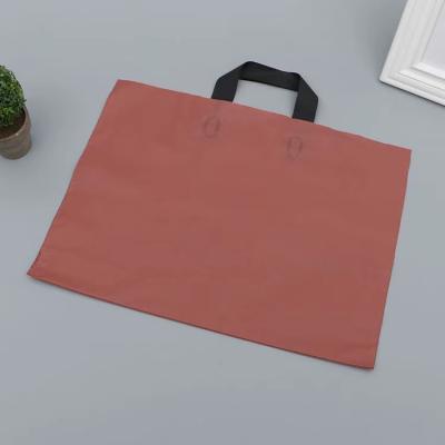 China Custom Printed BIODEGRADABLE Logo Clothes Shopping Poly Pe Plastic Shopping Bag With Soft Loop Handle for sale