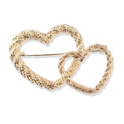 China 2021 hot new design cute two heart gold alloy brooch for sale