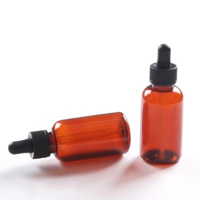 China 2 oz Custom Recyclable PET Material Plastic Amber Yellow Black Liquid Dropper Bottle for sale