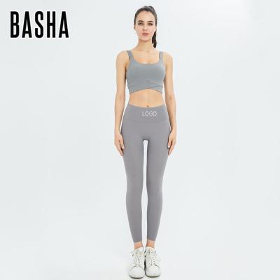 China BASHAsports Breathable Yoga Tops Nude Seamless Cross Ties Yoga Vest Hip Lift Fitness Pants Two Piece Set for sale