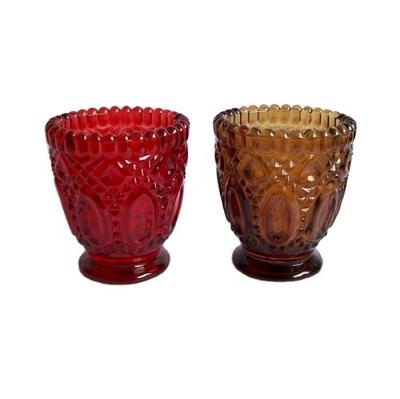 China Religious activities wholesale glass embossed glass votive tea light holder with customized color spraying for sale