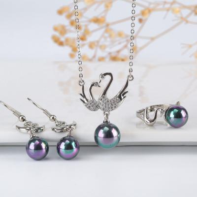 China TRENDY Pearl Jewelry Set Colorful Round Shape Stainless Steel Pearl Swan Necklace Ring Earrings Inlaid Jewelry Set for sale