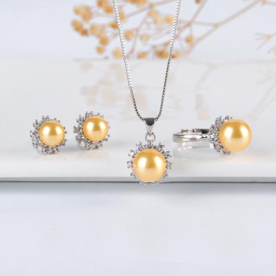 China TRENDY Pearl Jewelry Set Gold Round Pearl Plated Inlaid Necklace Ring Earrings Stainless Steel Jewelry Set for sale